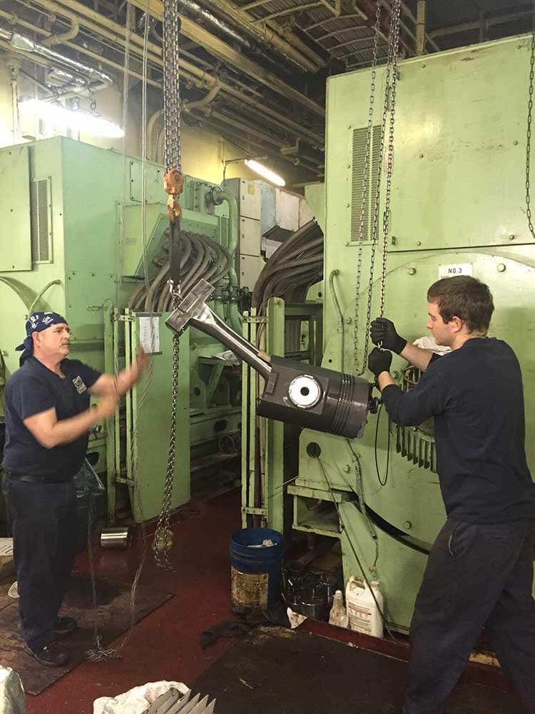 Maersk Idaho - Technicians work on engine